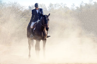 Man riding horse