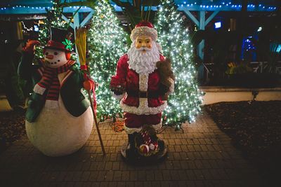 Full length of woman standing at night