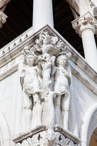 Low angle view of statue of historic building