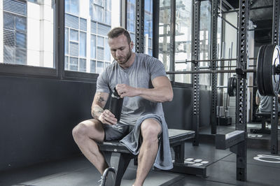 Man working out at urban gym in bangkok