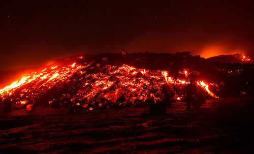 Lava flow on etna volcano during a eruption - sicily