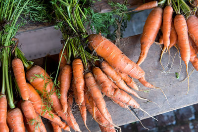 High angle view of carrots for sale