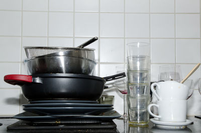 Stack of utensils on kitchen counter