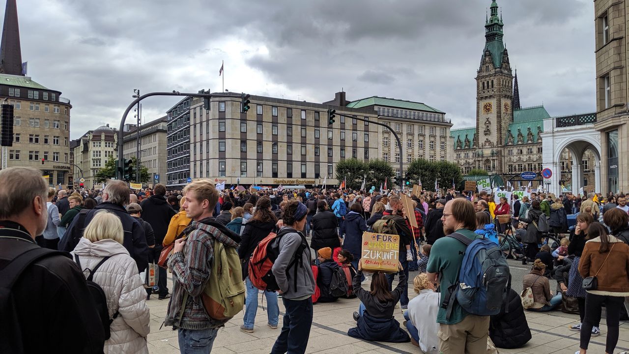 architecture, built structure, crowd, building exterior, large group of people, group of people, city, real people, women, men, building, sky, adult, street, nature, lifestyles, day, cloud - sky, travel destinations, outdoors