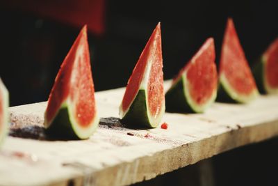 Close-up of watermelon slices on table