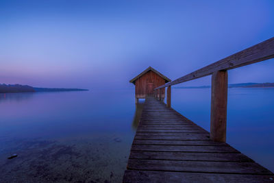 Pier over sea against sky