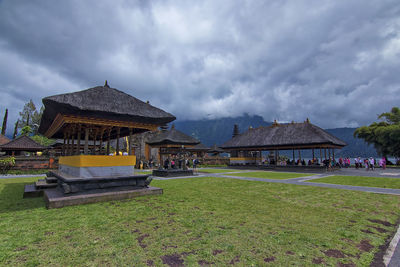 Unique architectural design of hutts around bratan lake inspired by balinese hinduism