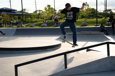 Full length of man skateboarding on skateboard