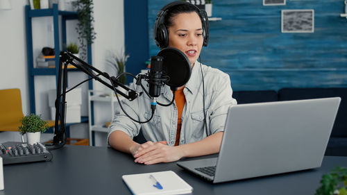 Businesswoman working at desk in office