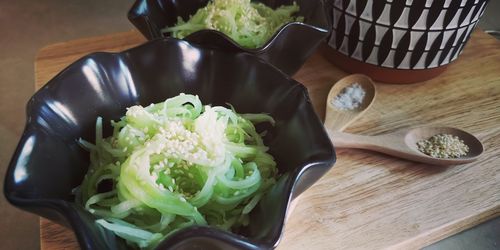 High angle view of chopped vegetables on cutting board