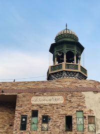 Low angle view of old building against sky