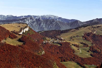 Sudtirol malga hiking trail in autumn foliage, trentino, italy, trento