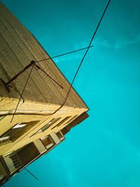 Low angle view of building against blue sky