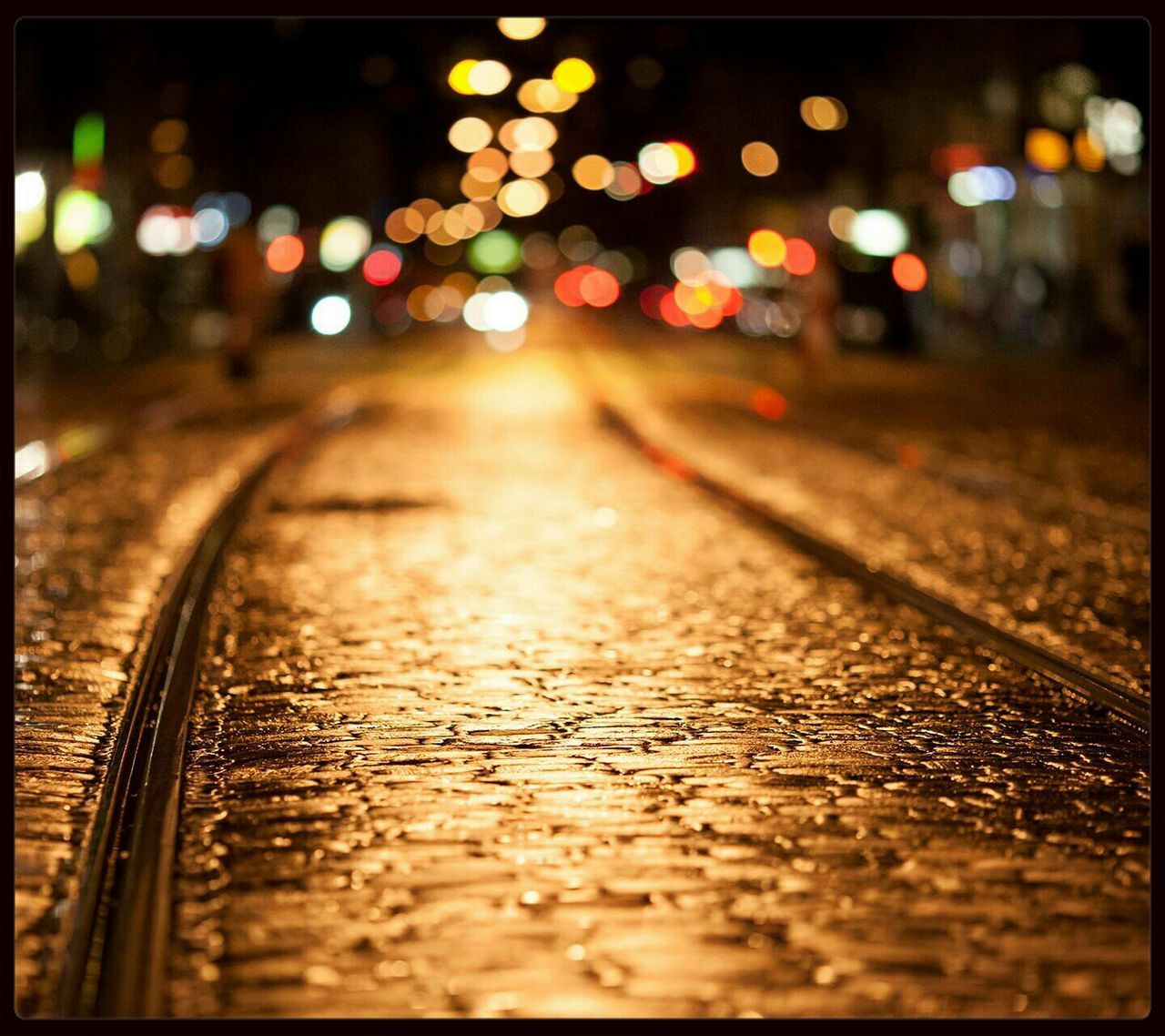 wet, transportation, the way forward, rain, surface level, illuminated, street, water, diminishing perspective, selective focus, defocused, road, night, drop, focus on foreground, reflection, season, vanishing point, weather, auto post production filter