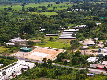 High angle view of buildings and road in city