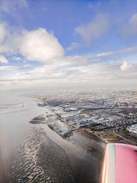 Aerial view of cityscape against sky