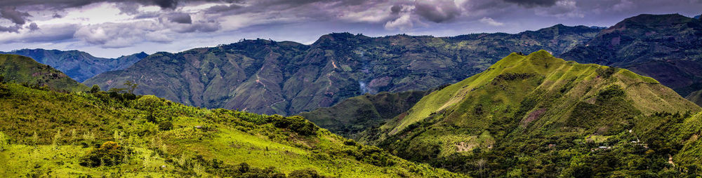 Panoramic view of mountain range against sky