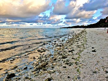 Scenic view of beach against sky