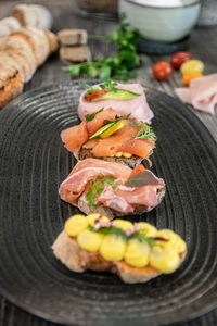 High angle view of fish in plate on table