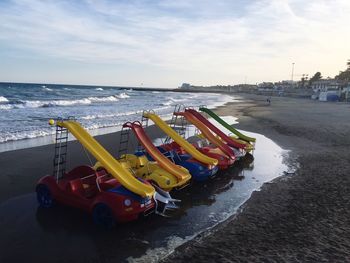 View of boats in sea against sky