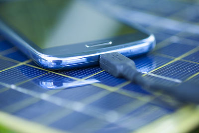 High angle view of mobile phone