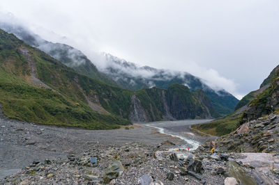 Fox glacier valley landscape with low clouds. hiking in new zealand