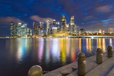 Illuminated city at waterfront