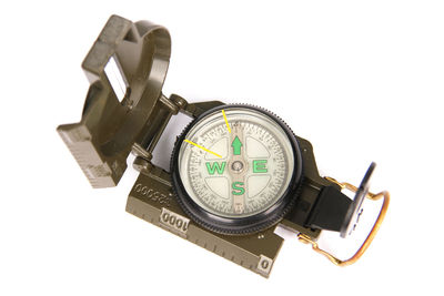 Close-up of clock tower against white background