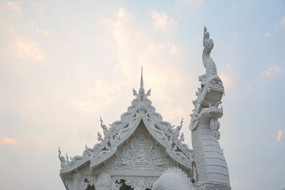 Low angle view of temple building against sky