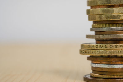 Stack of coins on table