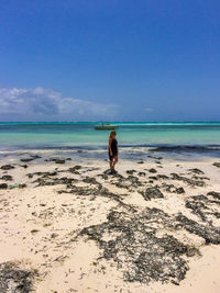 Happy woman on the mythical pingwe beach