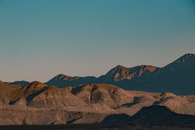 Scenic view of mountains against sky during sunset