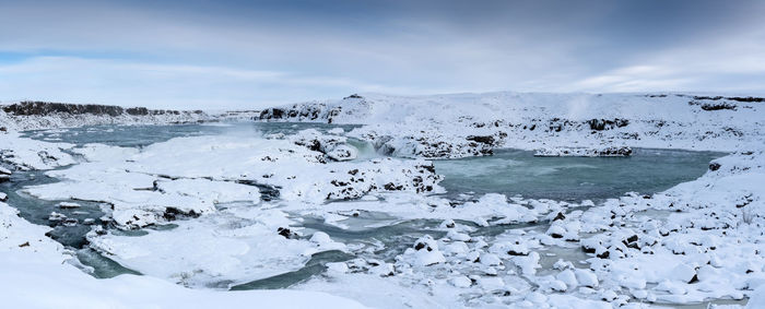Panoramic image of the frozen waterfall urridafoss, iceland, europe