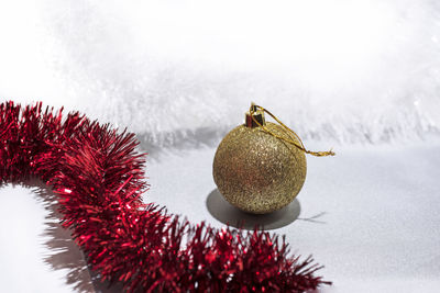 Close-up of christmas decorations on snow