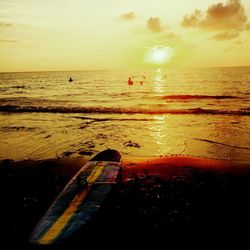 Scenic view of sea at sunset