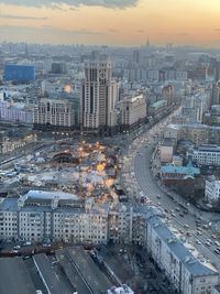 High angle view of traffic on city street and buildings