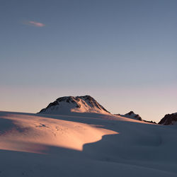 Scenic view of desert against clear sky