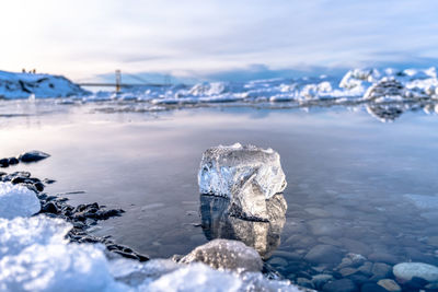 Scenic view of frozen sea against sky