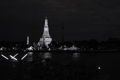 Illuminated buildings in city at night