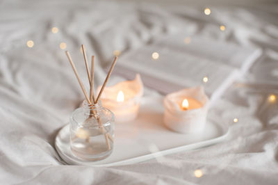 Close-up of wedding rings on table