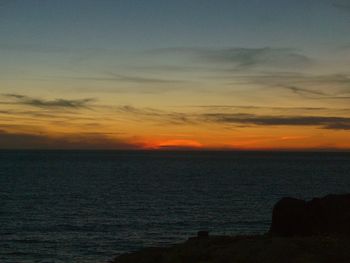 Scenic view of silhouette landscape against sky during sunset