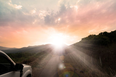 Scenic view of mountains against sky during sunset