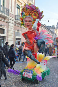 Statue of woman on street