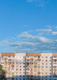 Buildings in city against sky