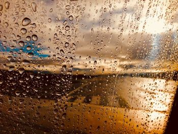 Full frame shot of wet glass window