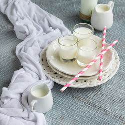 High angle view of coffee cups on table