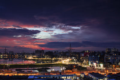 Illuminated buildings in city at night