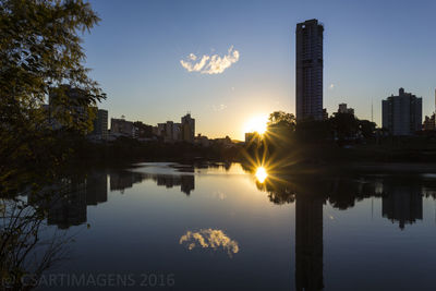Sun shining over river