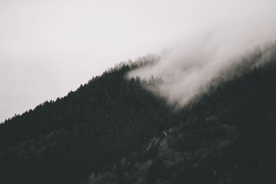 Scenic view of clouds over landscape against sky