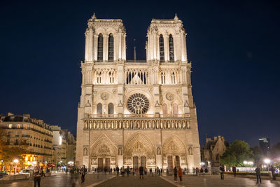 Notre dame de paris - famous cathedral with night illumination before fire april 15, 2019